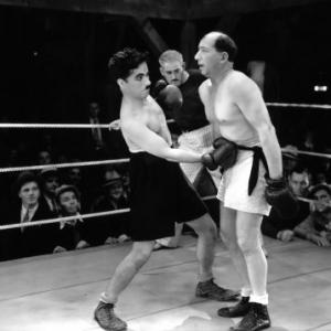 Still of Charles Chaplin and Hank Mann in City Lights 1931