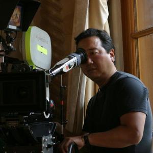 Camera assistant Joshua Harrison and Michael Goi, ASC line up a shot for 