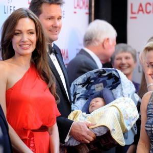 Angelina Jolie Will Wallace and son Bodie Wallace at the premiere of Tree of Life