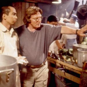 Stan Egi with director Alan Parker on the set of Come See The Paradise