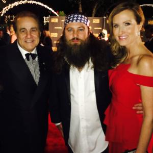 Executive Producer Larry Thompson L with Willie Robertson Center and Korie Robertson R at the 22nd Annual Movieguide Awards held at the Sierra Ballroom at the Universal Hilton Universal City CA on February 7 2014