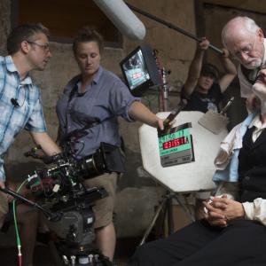 Jeremy behind the camera with 1st AC Liz Heslep on the set of Killing Lincoln Jesse Johnson gets a shave