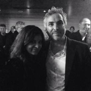 With Alfonso Cuaron at a private party in his honour; pre Golden Globe Awards. Hollywood, CA, USA, January 2014.