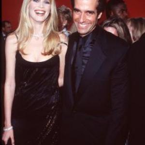 Claudia Schiffer and David Copperfield at event of The 70th Annual Academy Awards (1998)