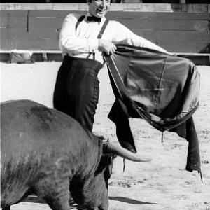 Herb Alpert with fake bull in bull ring, 1966