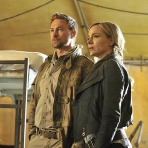 Still of Julie Benz and Grant Bowler in Defiance 2013