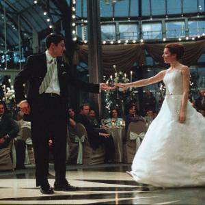 Just-marrieds Jim (JASON BIGGS) and Michelle (ALYSON HANNIGAN) dance on the happiest day of their lives (sort of).