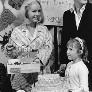Debbie Reynolds with Pat Boone and daughter Carrie Fisher circa 1965