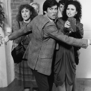 Still of Pierce Brosnan Delta Burke and Carole White in Remington Steele 1982