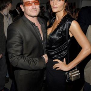 Helena Christensen and Bono at event of Volver (2006)