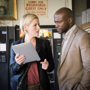 Still of Taye Diggs and Kathleen Robertson in Murder in the First (2014)