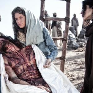 Mary with Jesus after hes been taken down from the cross Scene from the Son of God Movie
