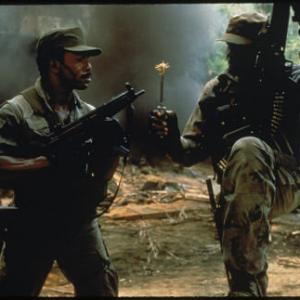 Still of Carl Weathers and Bill Duke in Grobuonis 1987