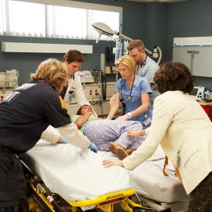 Peter Facinelli Edie Falco Eve Best Lenny Jacobson and Stephen Wallem in Nurse Jackie 2009