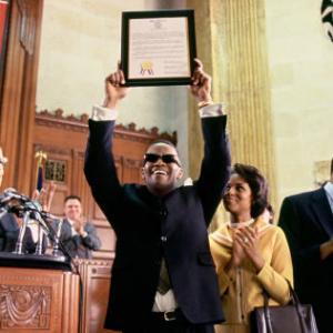 Ray Charles (JAMIE FOXX) is honored by the State of Georgia (with KERRY WASHINGTON as Della Bea Robinson by his side) as 