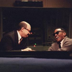 CURTIS ARMSTRONG as Atlantic Records? Ahmet Ertegun and JAMIE FOXX as American legend Ray Charles in the musical biographical drama, Ray.
