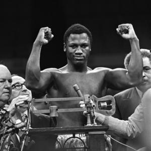 Joe Frazier weighing in before his fight against Muhammad Ali