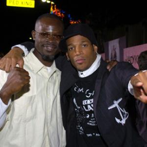 Djimon Hounsou and Marlon Wayans at event of The Ladykillers 2004