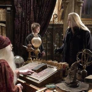 Lr Professor Dumbledore RICHARD HARRIS Harry Potter DANIEL RADCLIFFE and Lucius Malfoy JASON ISAACS