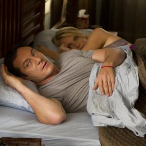 Still of Jason Isaacs and Laura Allen in Awake (2012)