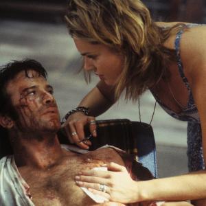 Still of Thomas Jane and Rebecca Romijn in The Punisher (2004)