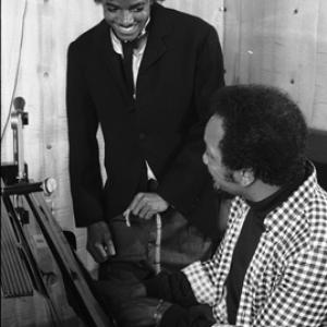 Michael Jackson and Quincy Jones composing songs in a Los Angeles recording studio