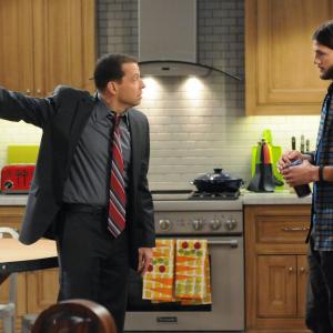Still of Ashton Kutcher and John Cryer in Two and a Half Men 2003