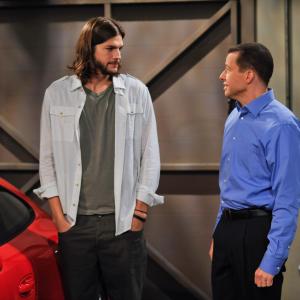 Still of Ashton Kutcher and John Cryer in Two and a Half Men (2003)