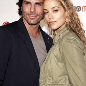 Elizabeth Berkley and Greg Lauren