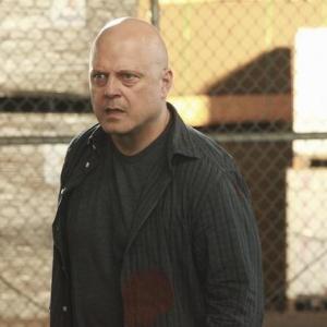 Still of Michael Chiklis and Lucy Lawless in No Ordinary Family No Ordinary Beginning 2011