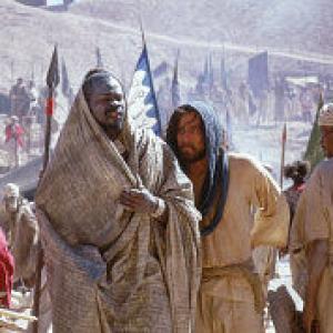 (Center left) Djimon Hounsou as Abou Fatma and (center right) Heath Ledger as Harry