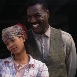 Still of Erykah Badu and Delroy Lindo in The Cider House Rules 1999