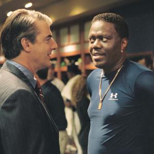 Milwaukee Brewers General Manager, Schembri (Chris Noth, left) is thrilled to have Stan Ross (Bernie Mac, right) back on the team.