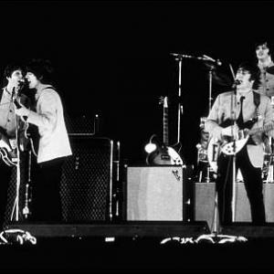 Beatles performing at Shea Stadium August 15 1965
