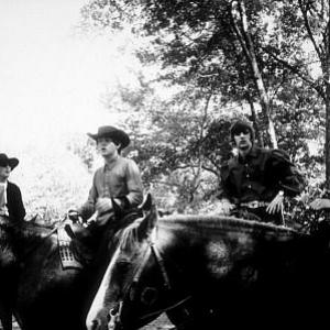 The Beatles  John Lennon Paul McCartne Ringo Starr  George Harrison on horseback in Ozarks Arkansas c 1965
