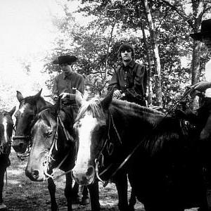 The Beatles John Lennon Paul McCartney Ringo Starr and George Harrison on horseback in Ozarks Arkansas c 1965
