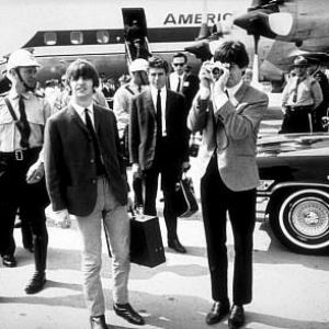 The Beatles Ringo Starr Derek Taylor Press Officer  Paul McCartney shooting with a camera Toronto Canada September 7 1964
