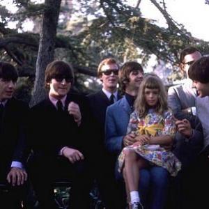 The Beatles  Geroge Harrison John Lennon Ringo Starr Paul McCartney accompanied by fans
