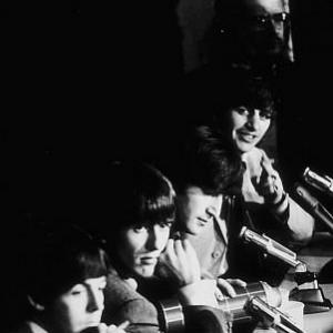 The Beatles Paul McCartney George Harrison John Lennon  Ringo Starr at a press conference c 1964