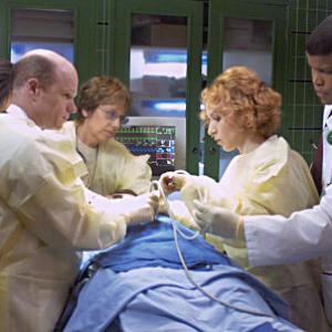 Left to right Paul McCrane Dr Romano Ming Na Dr Chen Nina Sablich Dr Horvat  Sharif Atkins Dr Gallant in ER episode 919  Things Change