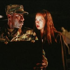 Still of James McDaniel and Heather Donahue in Taken (2002)