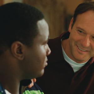 Still of Tim McGraw and Quinton Aaron in The Blind Side (2009)