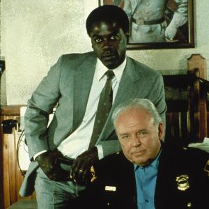 Still of Carroll O'Connor and Howard E. Rollins Jr. in In the Heat of the Night (1988)