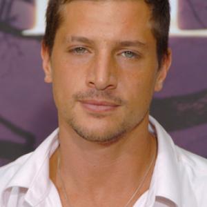 Simon Rex at event of The Village 2004