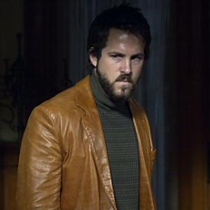 RYAN REYNOLDS stars as George Lutz in THE AMITYVILLE HORROR.