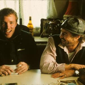 Brad Pitt and Guy Ritchie in Snatch. (2000)