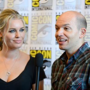 Rebecca Romijn and Paul Scheer at event of NTSF:SD:SUV (2011)
