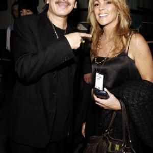 Carlos Santana and Dina Lohan at event of 2005 American Music Awards 2005