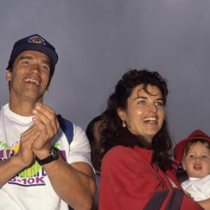 Arnold Schwarzenegger with Maria Shriver and daughter Catherine circa 1990