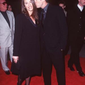 Pierce Brosnan and Keely Shaye Smith at event of Dantes virsukalne 1997